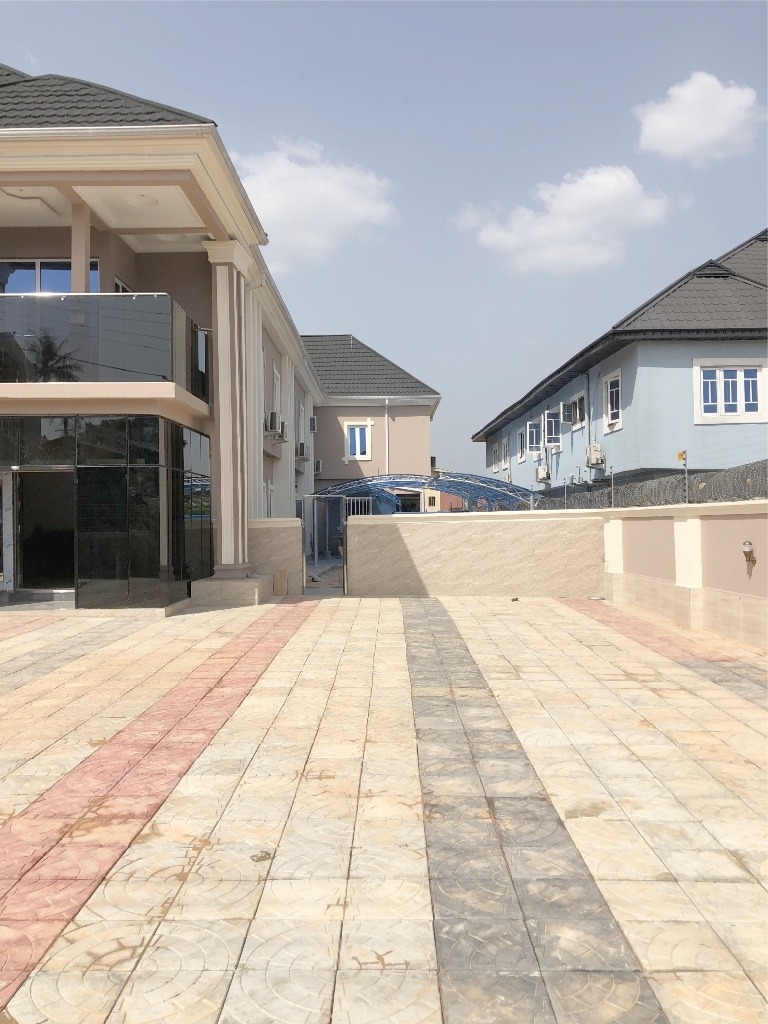 Paved Courtyard & Secure Parking at Benik Western Hotel